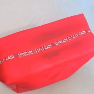 Caroline Hirons. skin care is self care coral jelly kit Cosmetic Bag